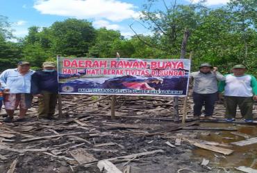 PENANGANAN KONFLIK BUAYA MUARA DI KAMPUNG SUNGAI RAWA, KECAMATAN SUNGAI APIT, SIAK